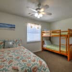 Queen Bed with Bunks for the Kids! Great for a small family who wants to keep an eye on the kids!    